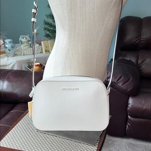 Michael Khors White Crossbody Bag Med Size purse that matches every outfit.